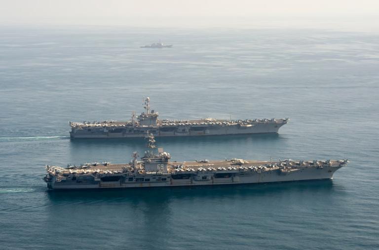 The U.S. Navy aircraft carriers Harry S. Truman and Dwight D. Eisenhower on joint operations in the CENTCOM region - source: Department of Defense