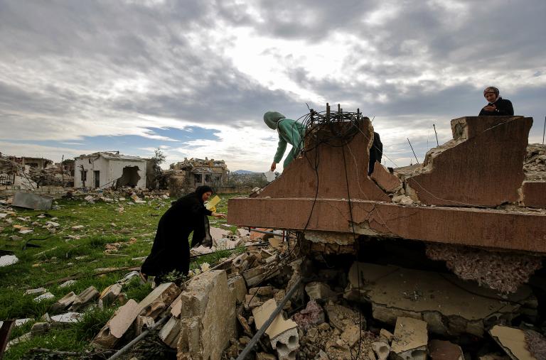 Photo of Shia women returning to their war-damaged village in south Lebanon.