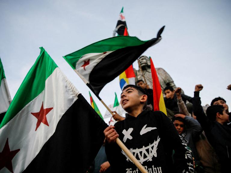 Syrians celebrate the fall of the Assad regime in Majdal Shams - source: Reuters