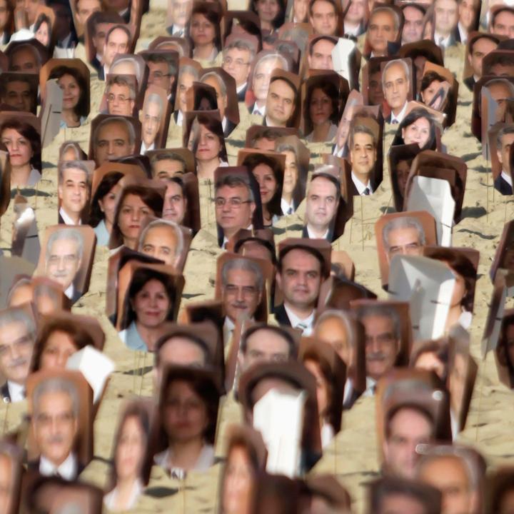 Portraits of Baha'i adherents arrested in Iran on display in Brazil - source: Reuters