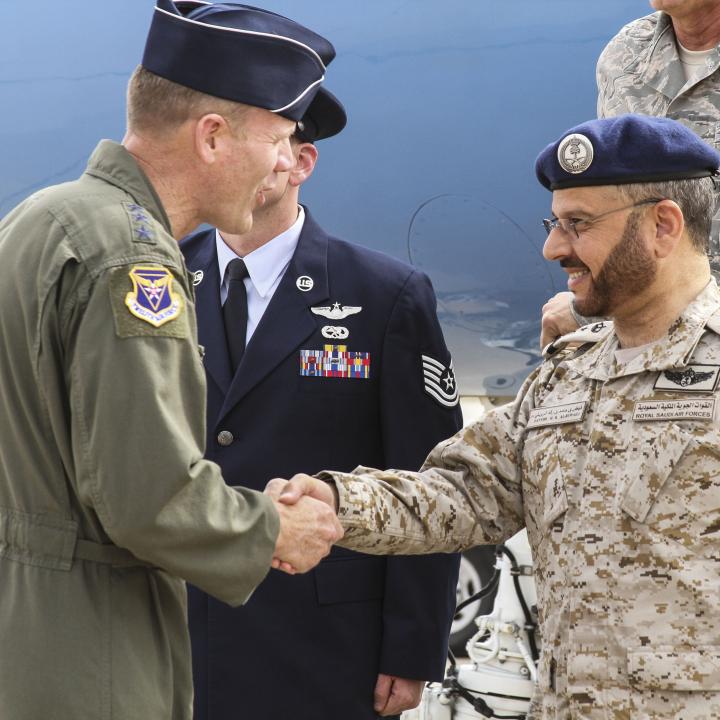 U.S. and Saudi air force officers greet one another during a joint exercise - source: Department of Defense