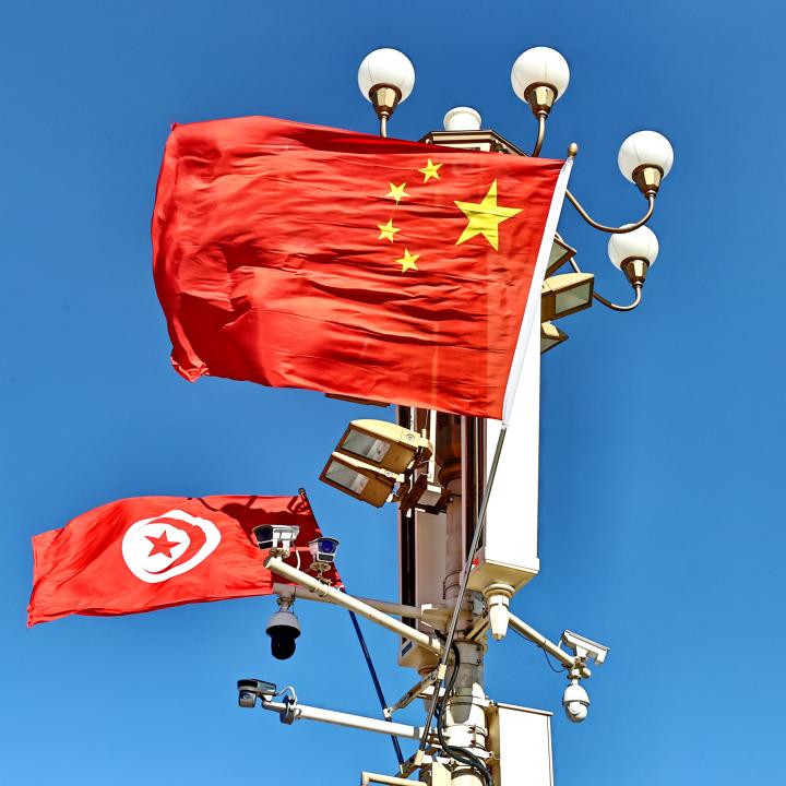Chinese and Tunisian flags on display in Beijing in 2024 - source: Reuters