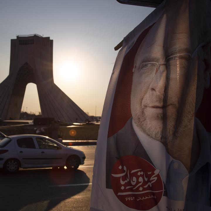 A campaign poster with an image of Majlis speaker Muhammad Baqer Qalibaf on display in Tehran's Azadi Square - source: Reuters