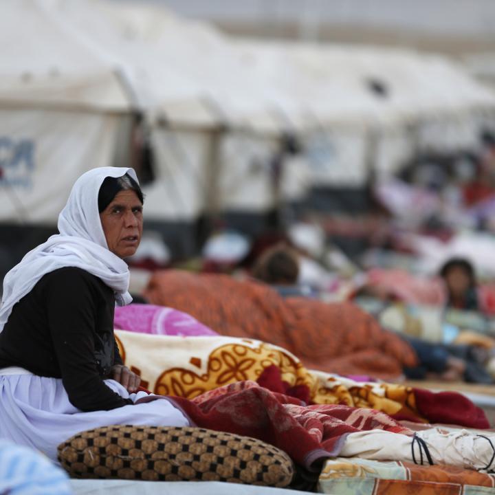 Yezidi women and children at a refugee camp in Iraq - source: Reuters