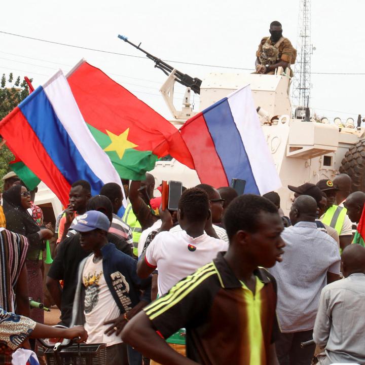 Demonstators wave Russian and Burkina Faso flags during an international conference in Ouagadougou in 2022 - source: Reuters