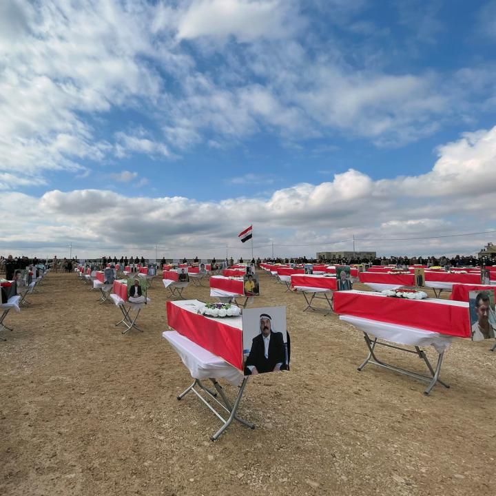 Coffins with the remains of people from the Yazidi minority, who were killed by Islamic State militants, after they were exhumed from a mass grave, before their burial in Kojo, Iraq February 6, 2021 - source: Reuters