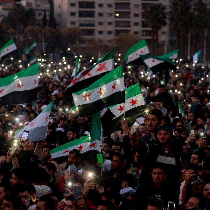 Syrian civilians celebrate the fall of the Assad regime in downtown Damascus in December 2024 - source: Reuters