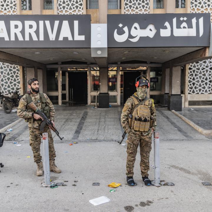 Photo showing Syrian rebels outside Aleppo International Airport.