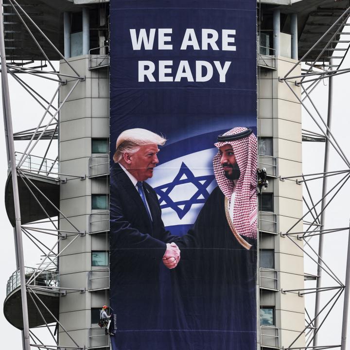 A billboard promoting a regional peace deal hangs in Ramat Gan, Israel, in February 2025 - source: Reuters