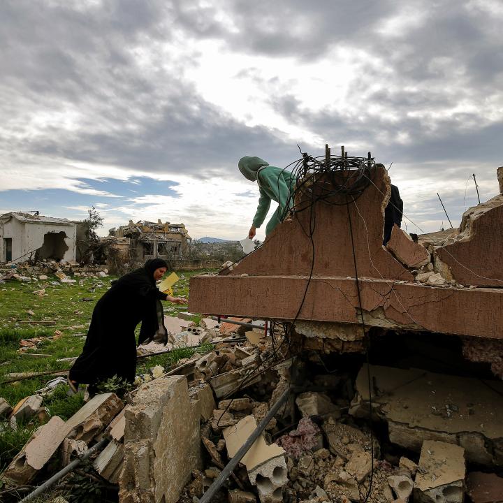 Photo of Shia women returning to their war-damaged village in south Lebanon.