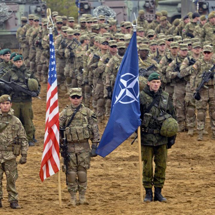 NATO solderis with alliance and national flags