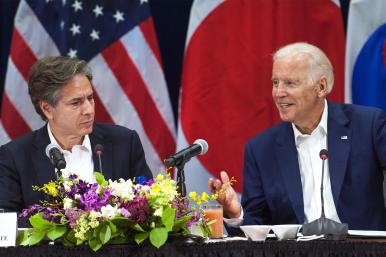 Secretary of State Antony Blinken speaking with President Joe Biden