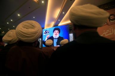 Photo of Lebanese Hezbollah leader Hassan Nasrallah onscreen while addressing a 2017 event.