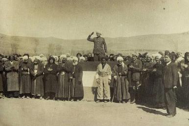 Qazi Muhammed salutes at the founding of the Kurdish Republic of Mahabad in 1946 - source: Wikimedia Commons