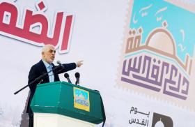 Hamas commander Yahya al-Sinwar speaks at a 2023 event in Gaza.