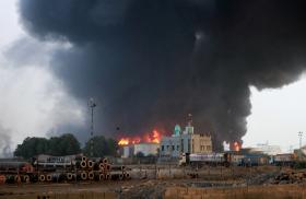 A fuel depot burns near the Yemeni port of Hodeida following overnight Israeli airstrikes - source: Reuters
