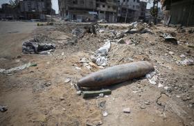 An unexploded missile fired by an Israeli aircraft lies among the rubble, amid the ongoing conflict between Israel and Hamas, in the northern Gaza Strip - source: Reuters