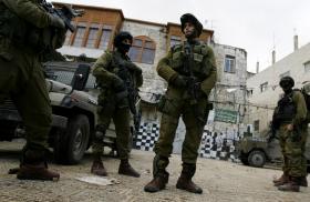 Israeli soldiers on patrol in the West Bank community of Nablus - source: Reuters